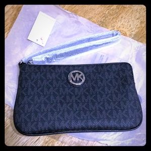 Brand new MICHAEL KORS monogrammed wristlet